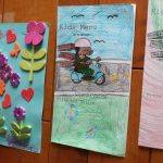 Decorated Kids Menus and kids art hang on the wall at Countryside Pizza and Grill