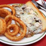 Philly cheese steak and onion rings, entree at Countryside Pizza and Grill in Veneta, Oregon